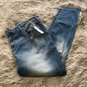 Women’s distressed jeans.